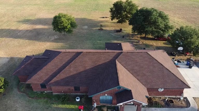 Brown shingle roof completed aerial