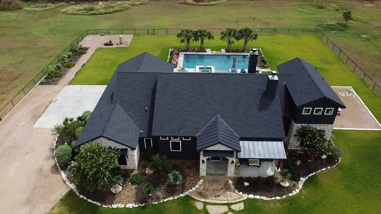 Hero shingle luxury home pool