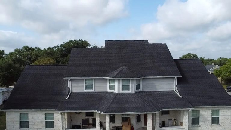 Large home dark shingle aerial
