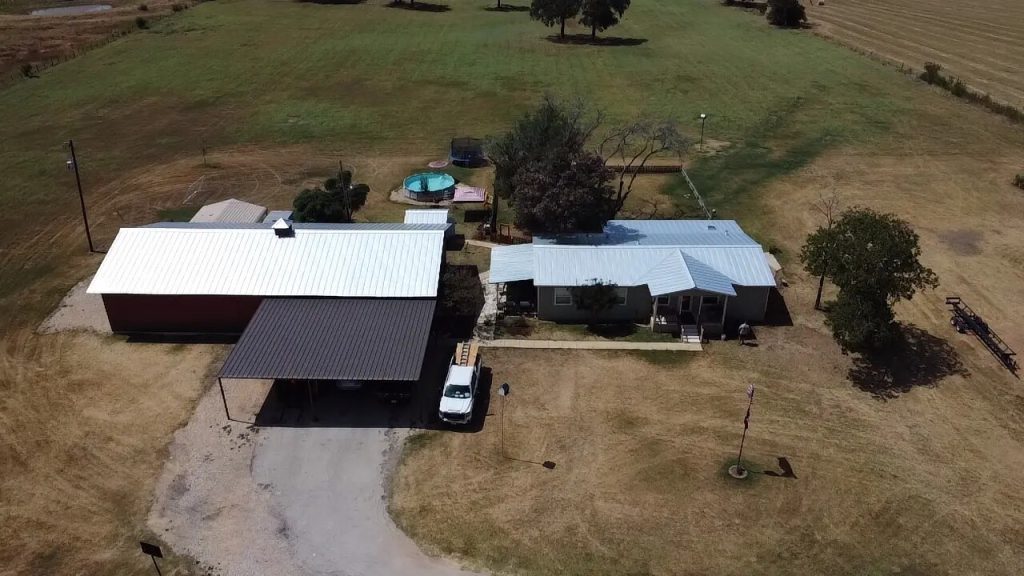 Aerial view of a completed metal roof